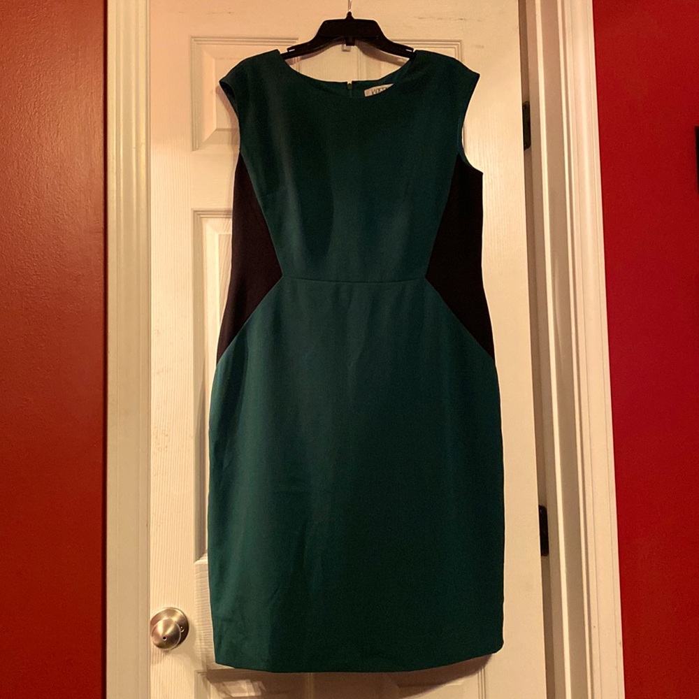 Dark green and black sleeveless dress.
